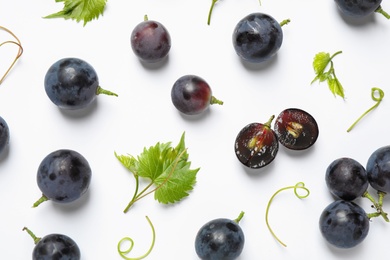 Fresh ripe juicy grapes on white background, top view