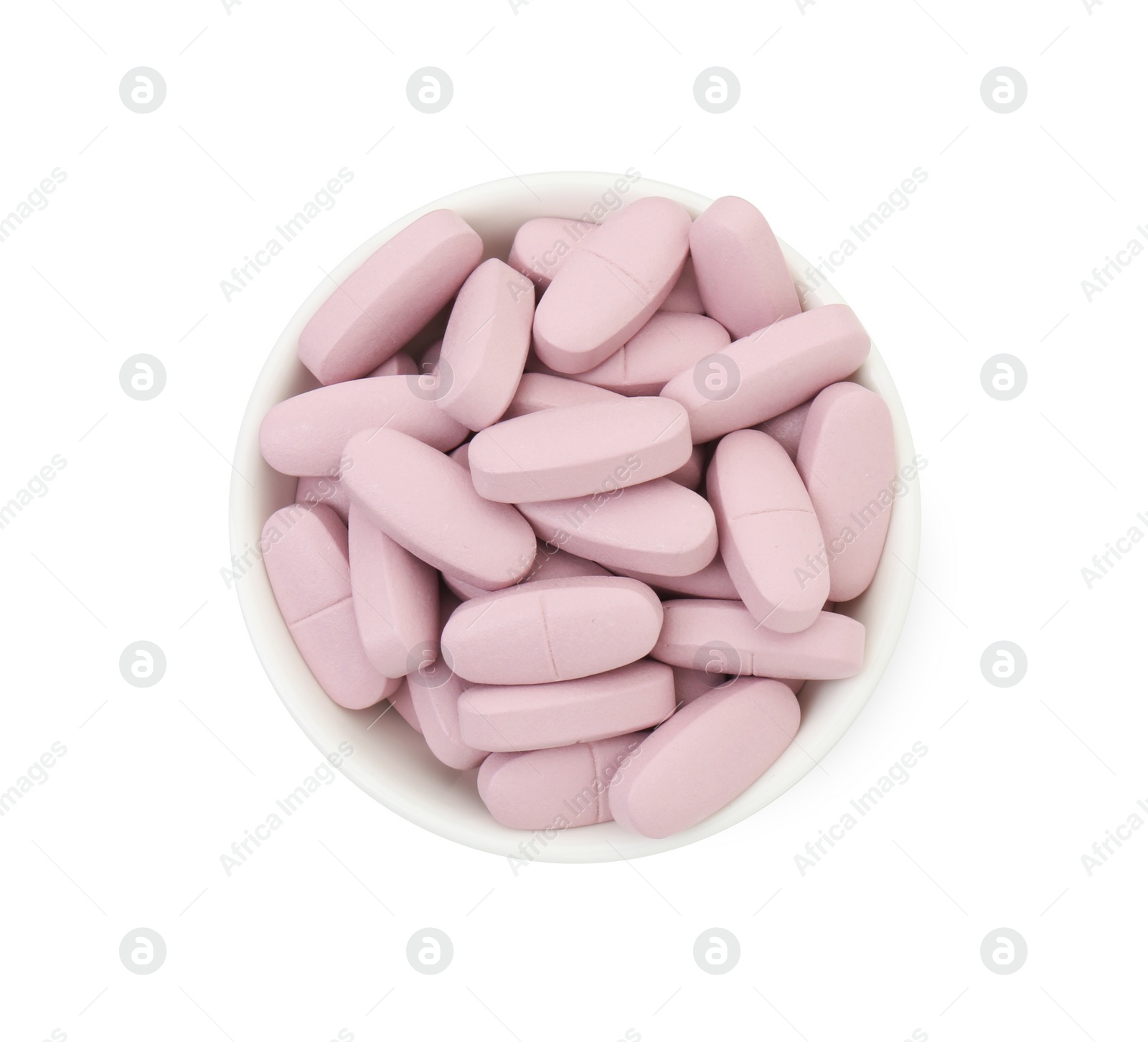 Photo of Vitamin pills in bowl isolated on white, top view. Health supplement