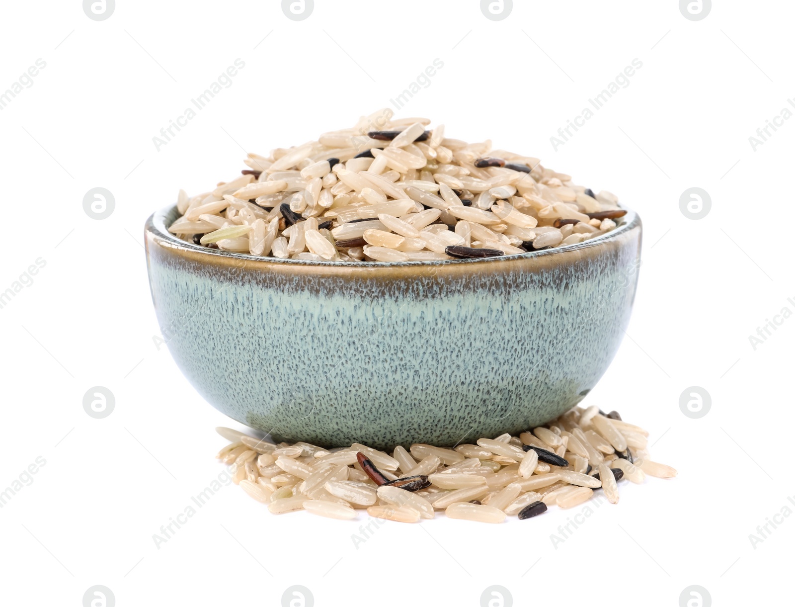 Photo of Bowl with raw unpolished rice isolated on white