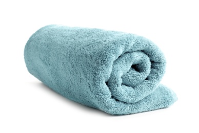 Photo of Rolled soft terry towel on white background