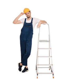 Photo of Worker in uniform and hard hat near metal ladder on white background