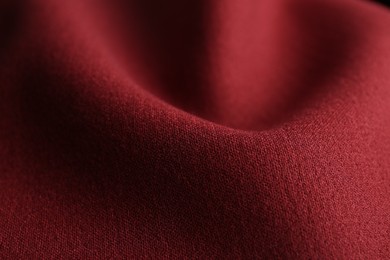 Photo of Texture of beautiful red fabric as background, closeup