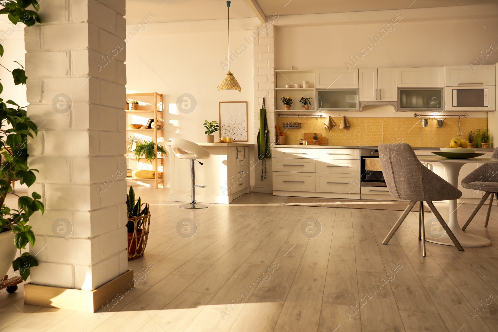 Photo of Modern kitchen interior with stylish white furniture