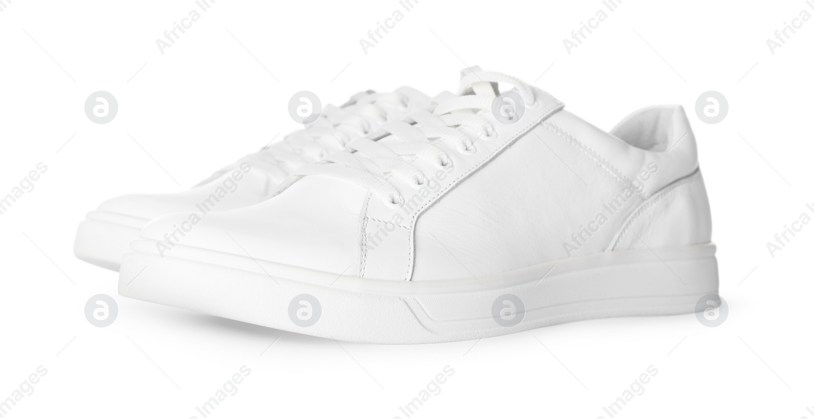 Photo of Pair of stylish sneakers isolated on white