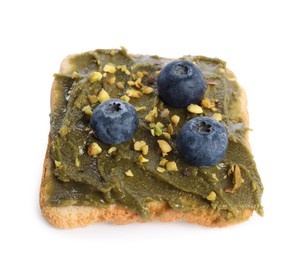 Photo of Toast with tasty pistachio butter, blueberries and nuts isolated on white
