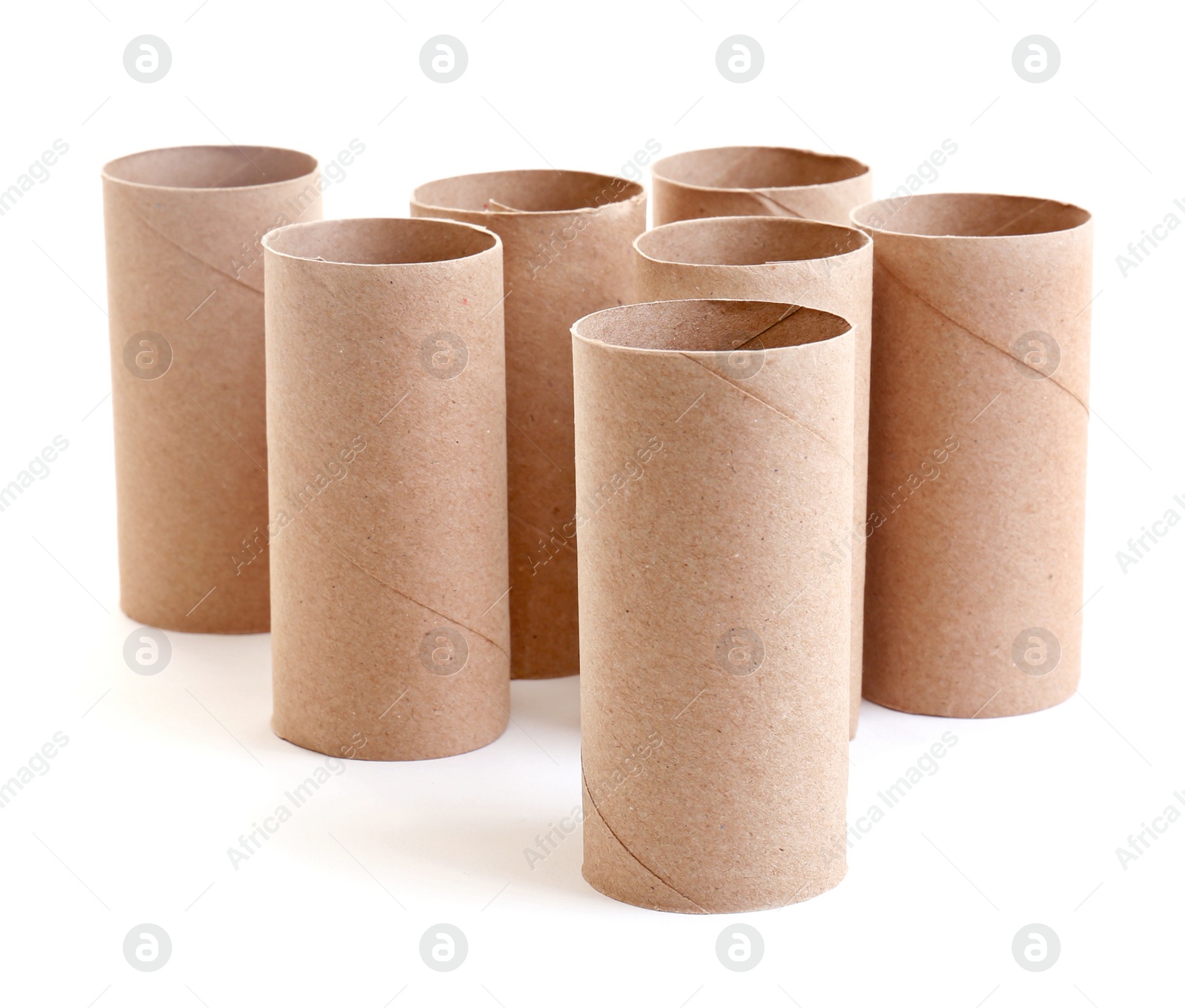 Photo of Empty paper toilet rolls on white background