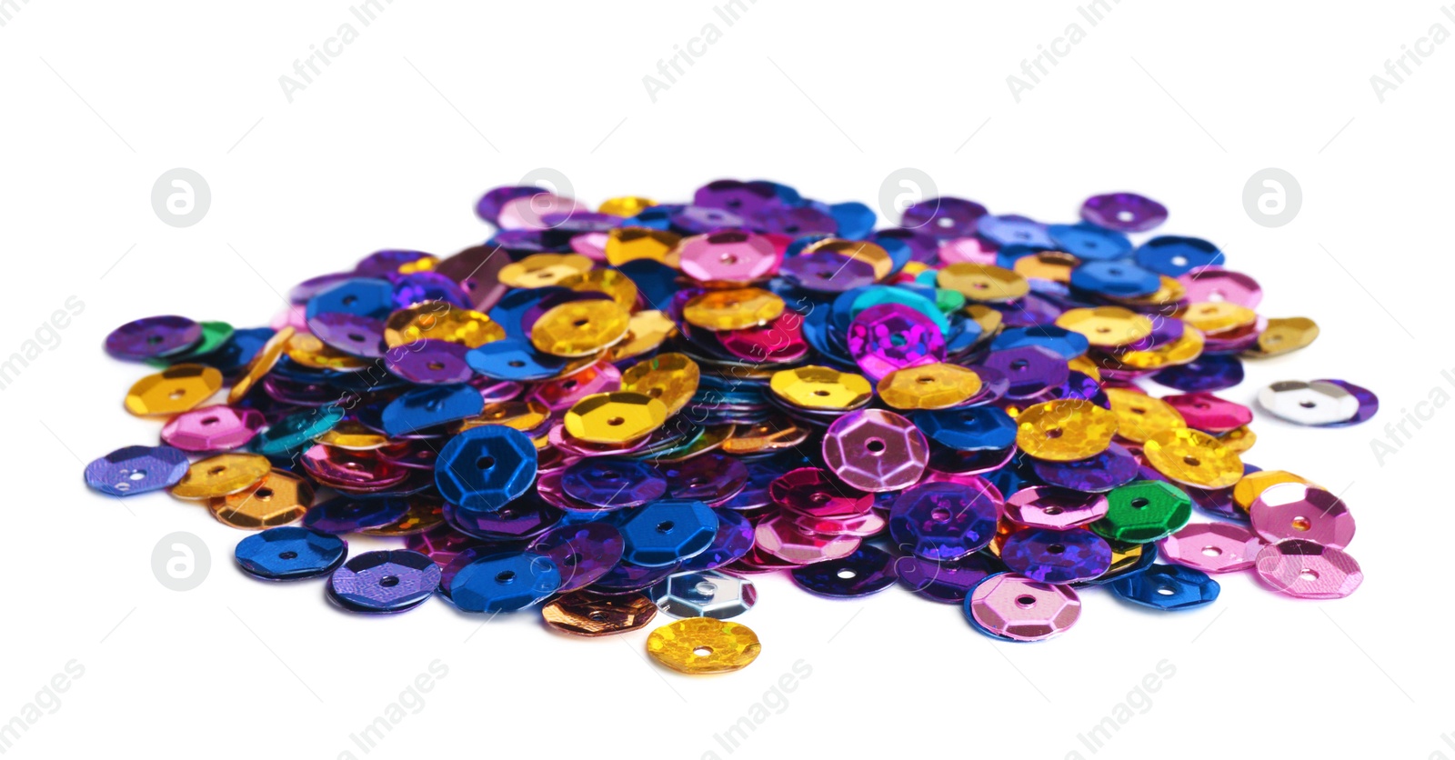 Photo of Pile of colorful sequins isolated on white