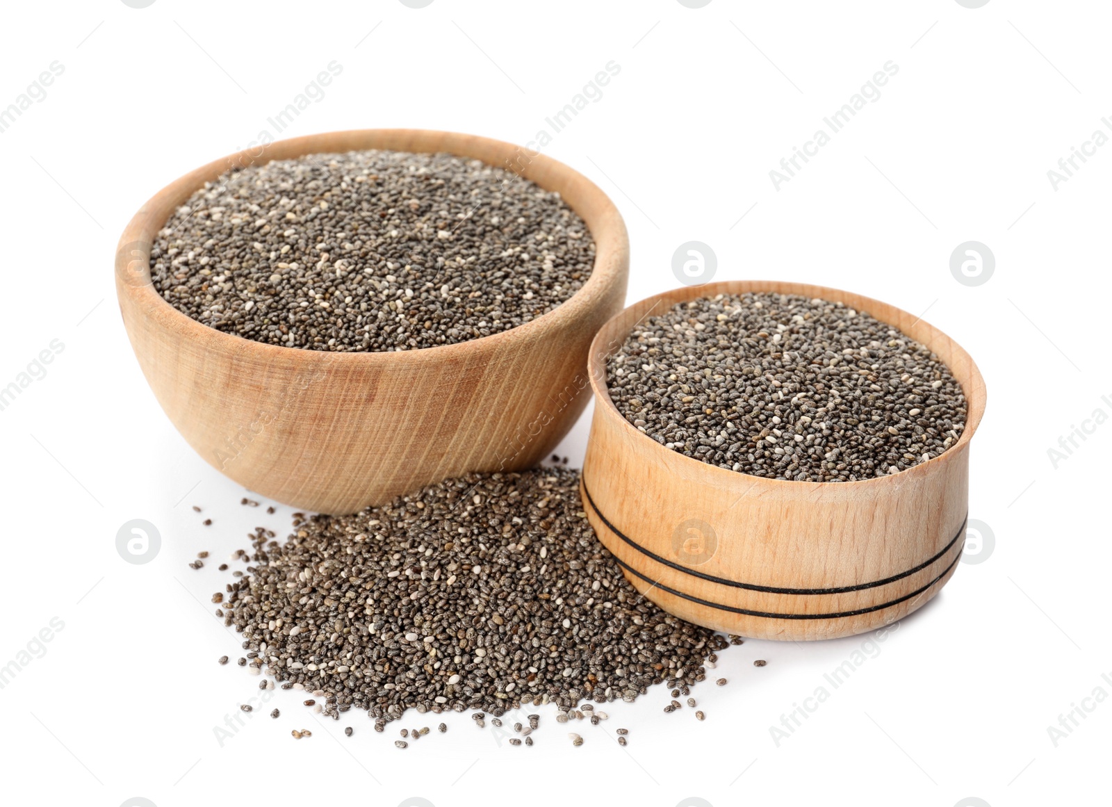 Photo of Chia seeds and wooden bowls on white background