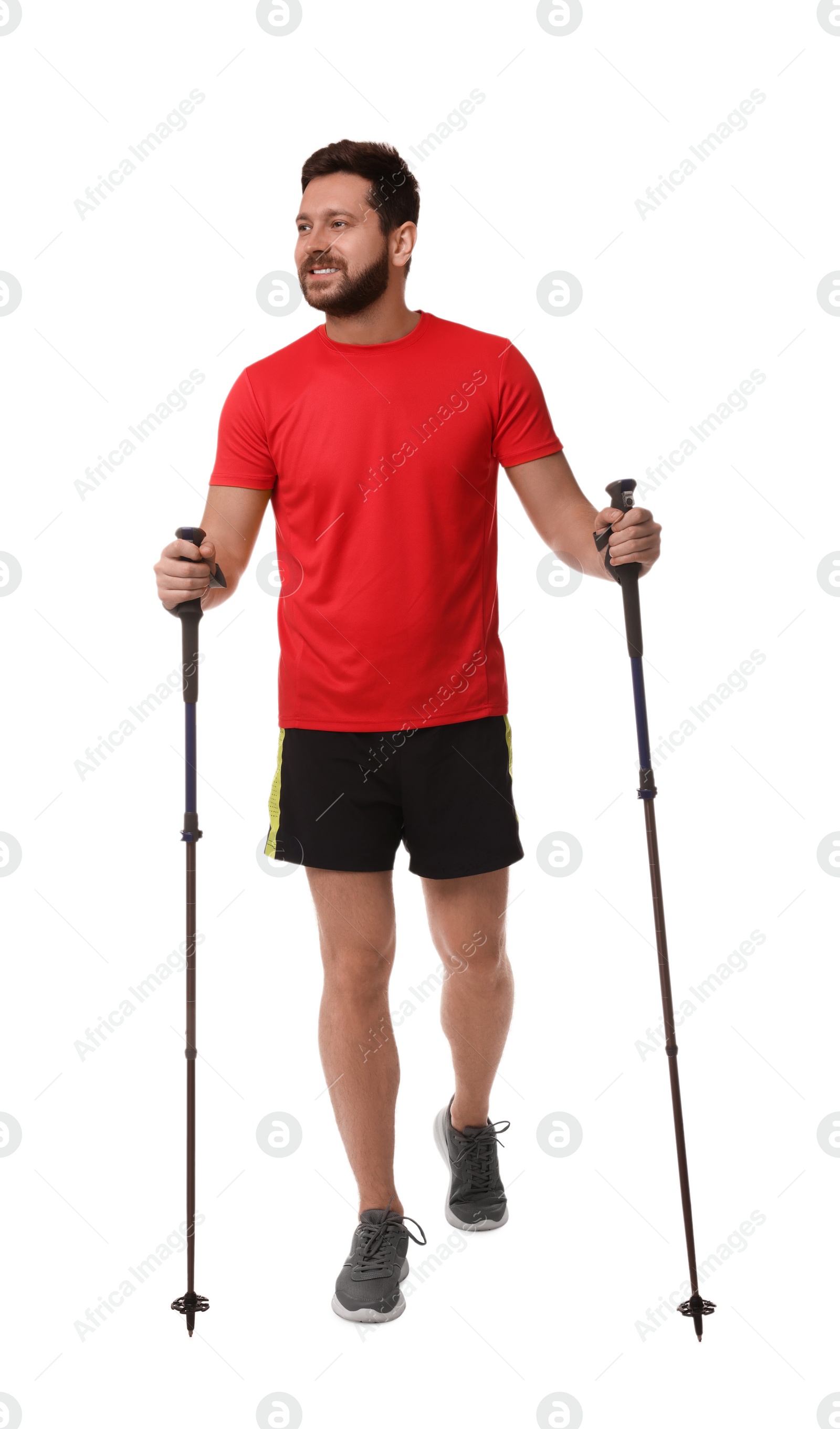 Photo of Man practicing Nordic walking with poles isolated on white