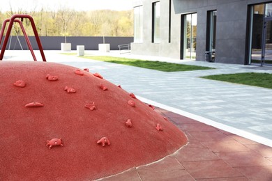 Photo of Climbing surface on outdoor playground in residential area