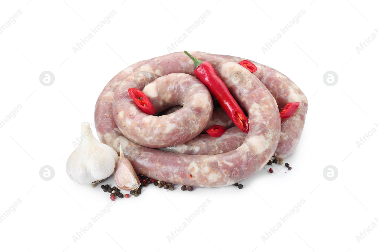 Photo of Homemade sausage, garlic, chili and peppercorns isolated on white