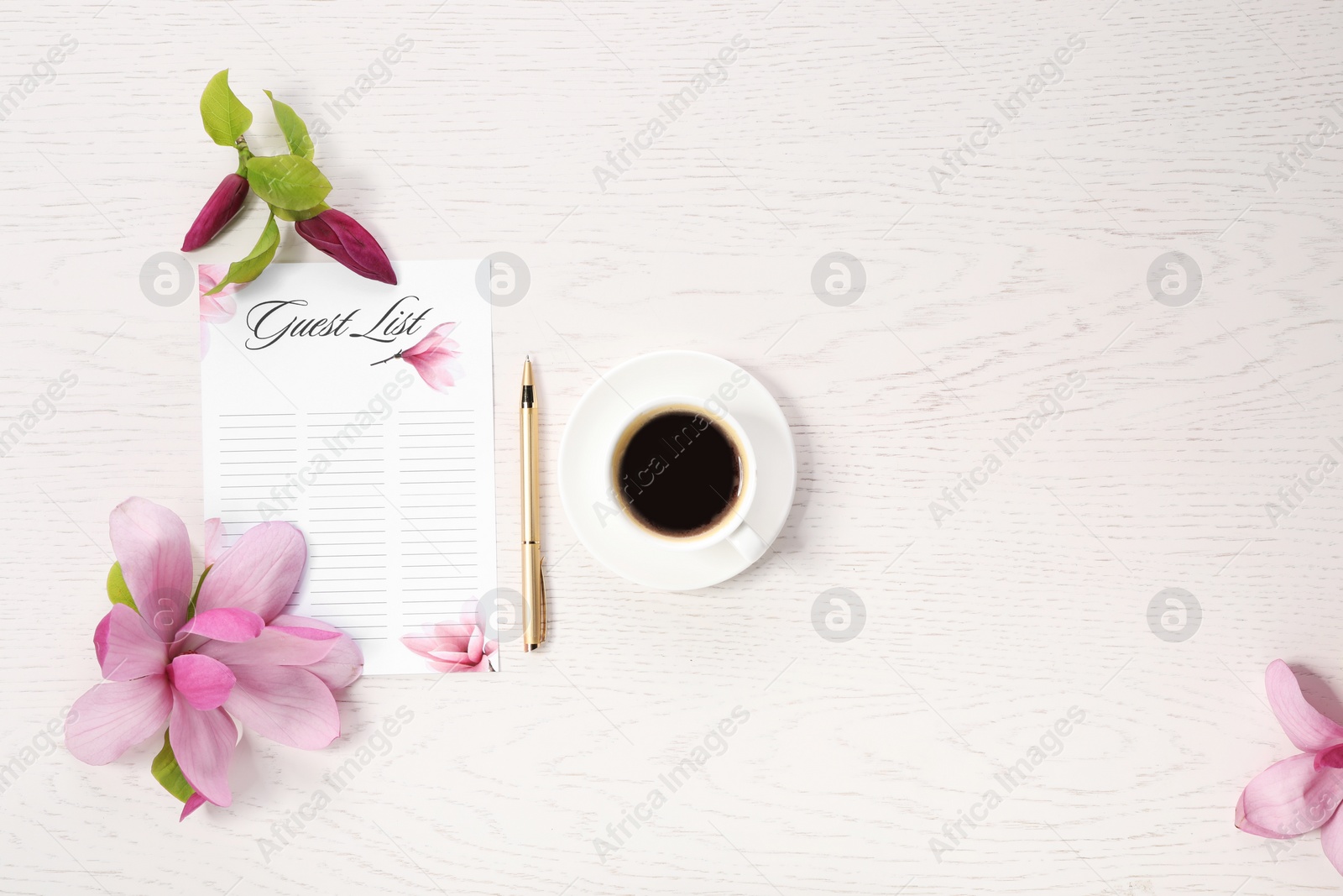 Photo of Guest list, coffee, pen and beautiful flowers on white wooden table, flat lay. Space for text