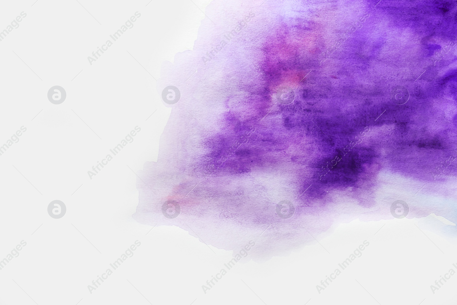 Photo of Colorful paint on white paper. Abstract background