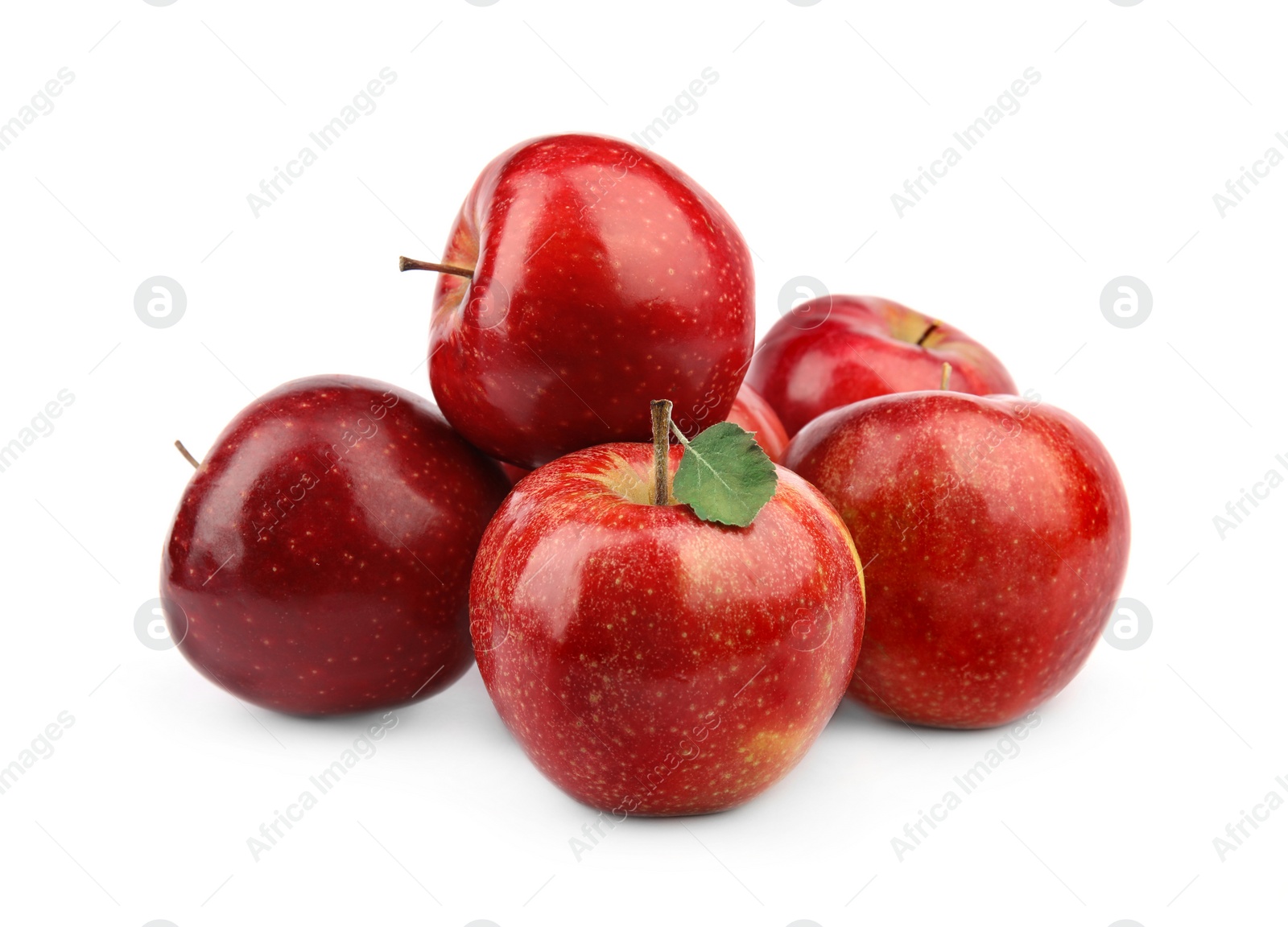 Photo of Ripe juicy red apples with leaf on white background