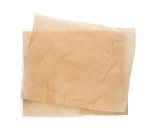 Photo of Sheets of brown baking paper on white background, top view