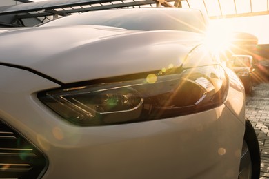 Luxury clean car outdoors on sunny day, closeup view