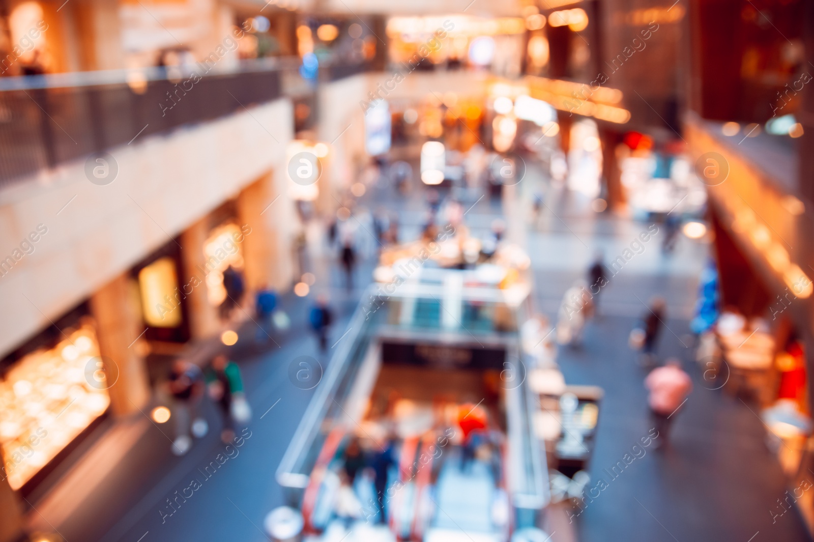 Photo of Big shopping mall with many stores, blurred view