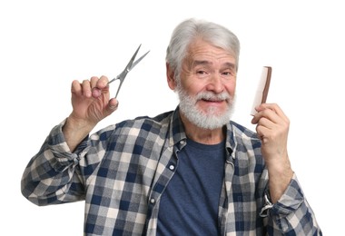 Photo of Senior man with mustache holding blade and comb on white background