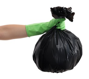 Photo of Woman holding plastic bag full of garbage on white background, closeup