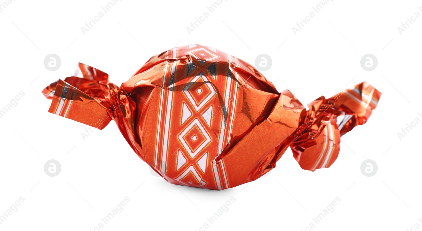 Photo of Candy in orange wrapper isolated on white