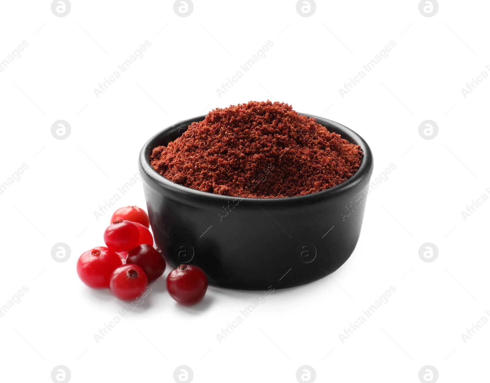 Photo of Cranberry powder in bowl and fresh berries isolated on white