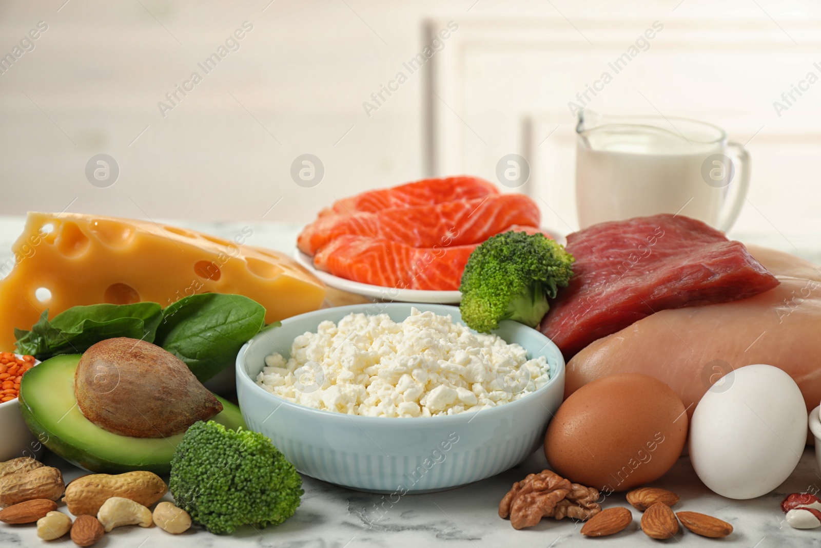 Photo of Different products rich in protein on table, closeup