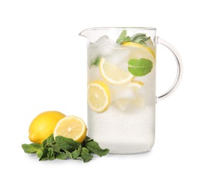 Photo of Freshly made lemonade with mint in jug isolated on white