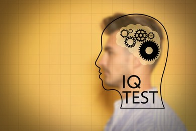 Image of Illustrated head with brain and blurred view of man on yellow background. IQ test