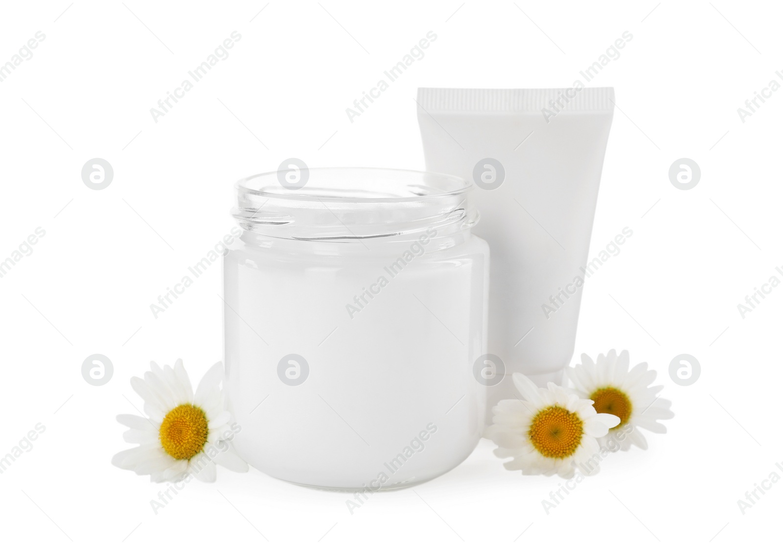 Photo of Different hand care cosmetic products and chamomiles on white background