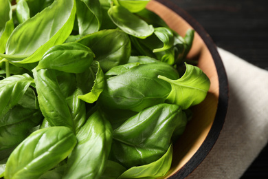 Fresh green basil leaves on  table, closeup