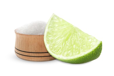 Image of Cut lime and salt isolated on white. Margarita cocktail ingredients