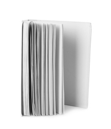 Open hardcover book with blank pages on white background