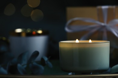 Beautiful burning candle on table, closeup. Space for text