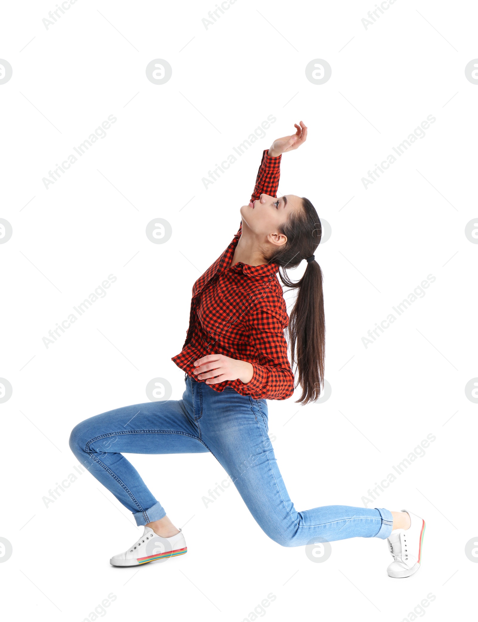 Photo of Young woman attracted to magnet on white background