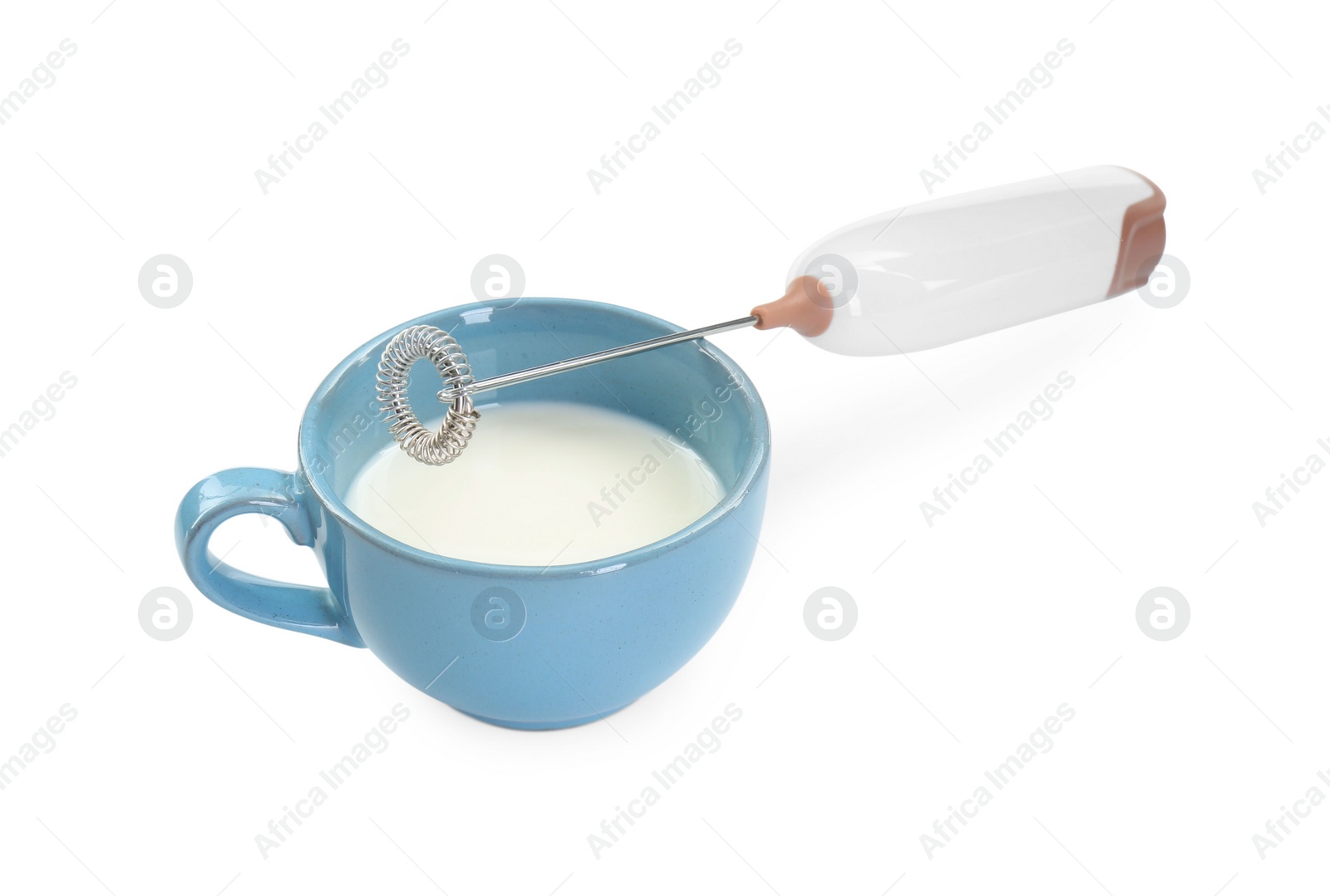 Photo of Milk frother wand and cup isolated on white