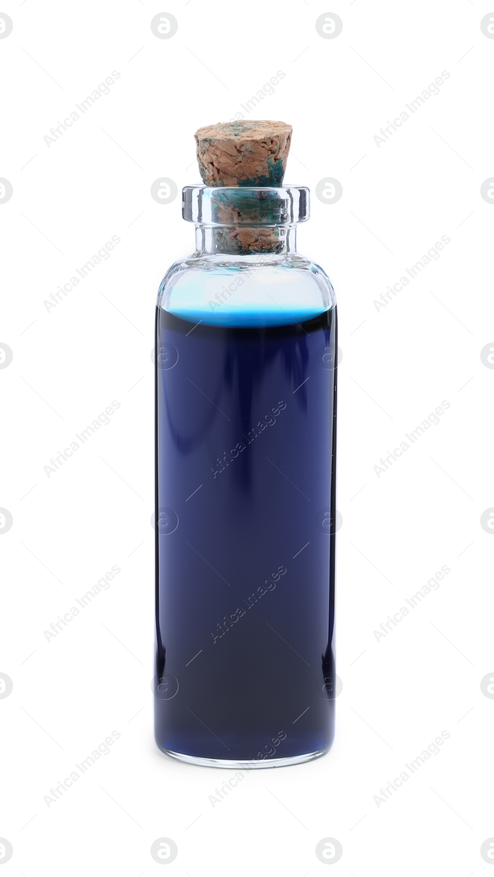 Photo of Glass bottle of blue food coloring on white background