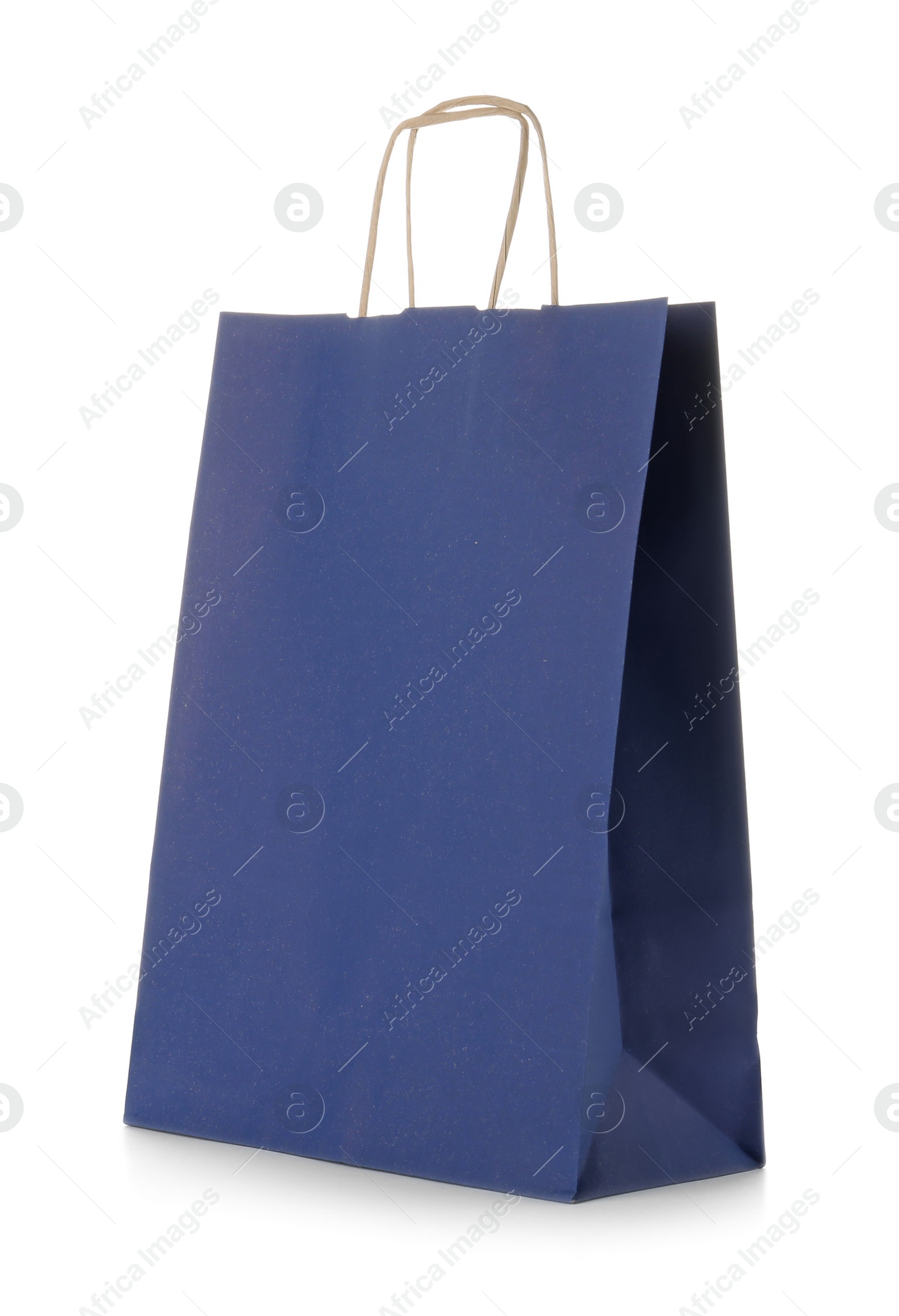 Photo of Mockup of paper shopping bag on white background