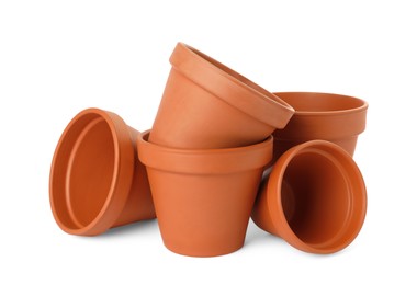 Photo of Empty clay flower pots isolated on white