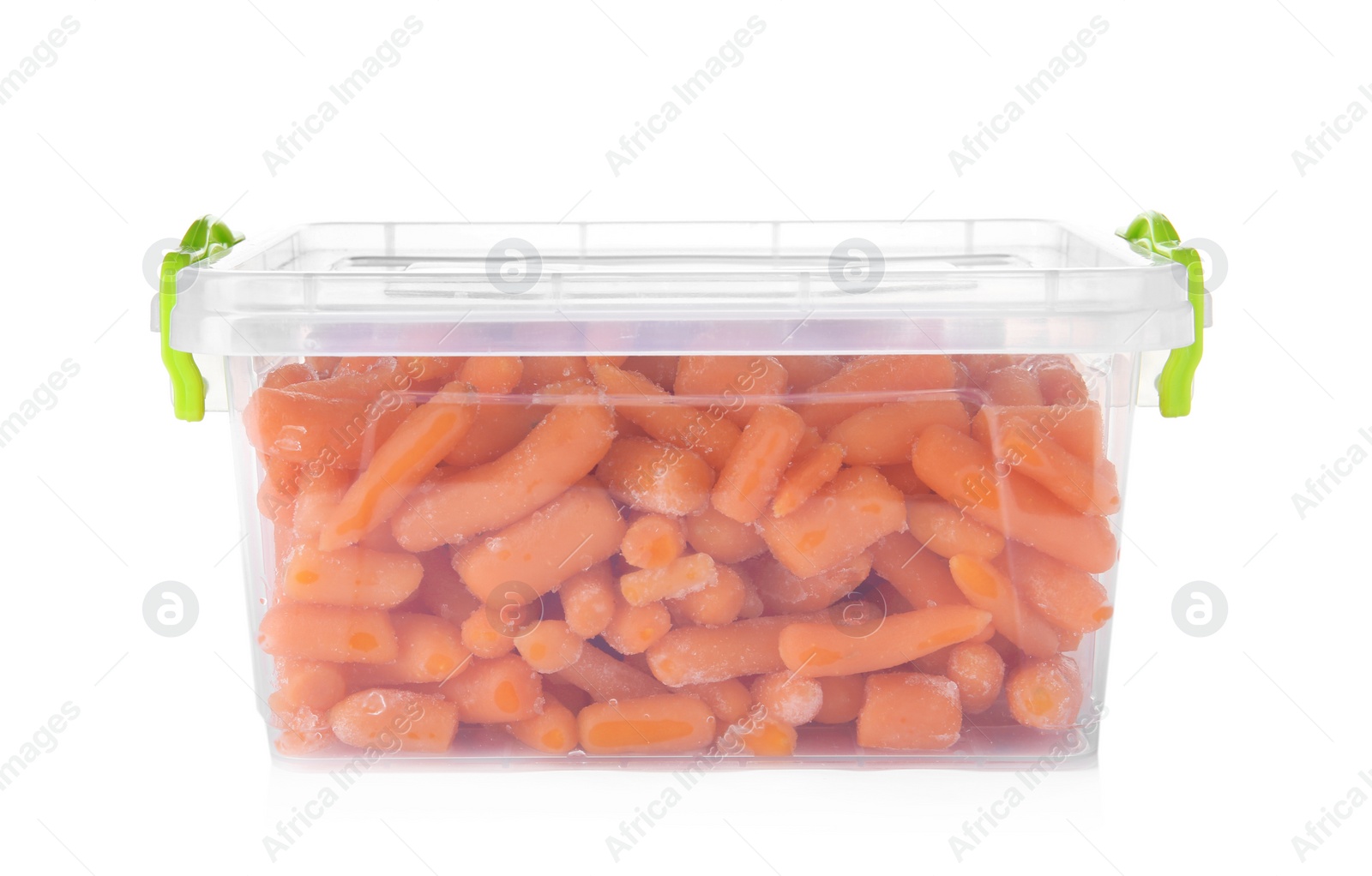 Photo of Plastic container with frozen baby carrots on white background. Vegetable preservation