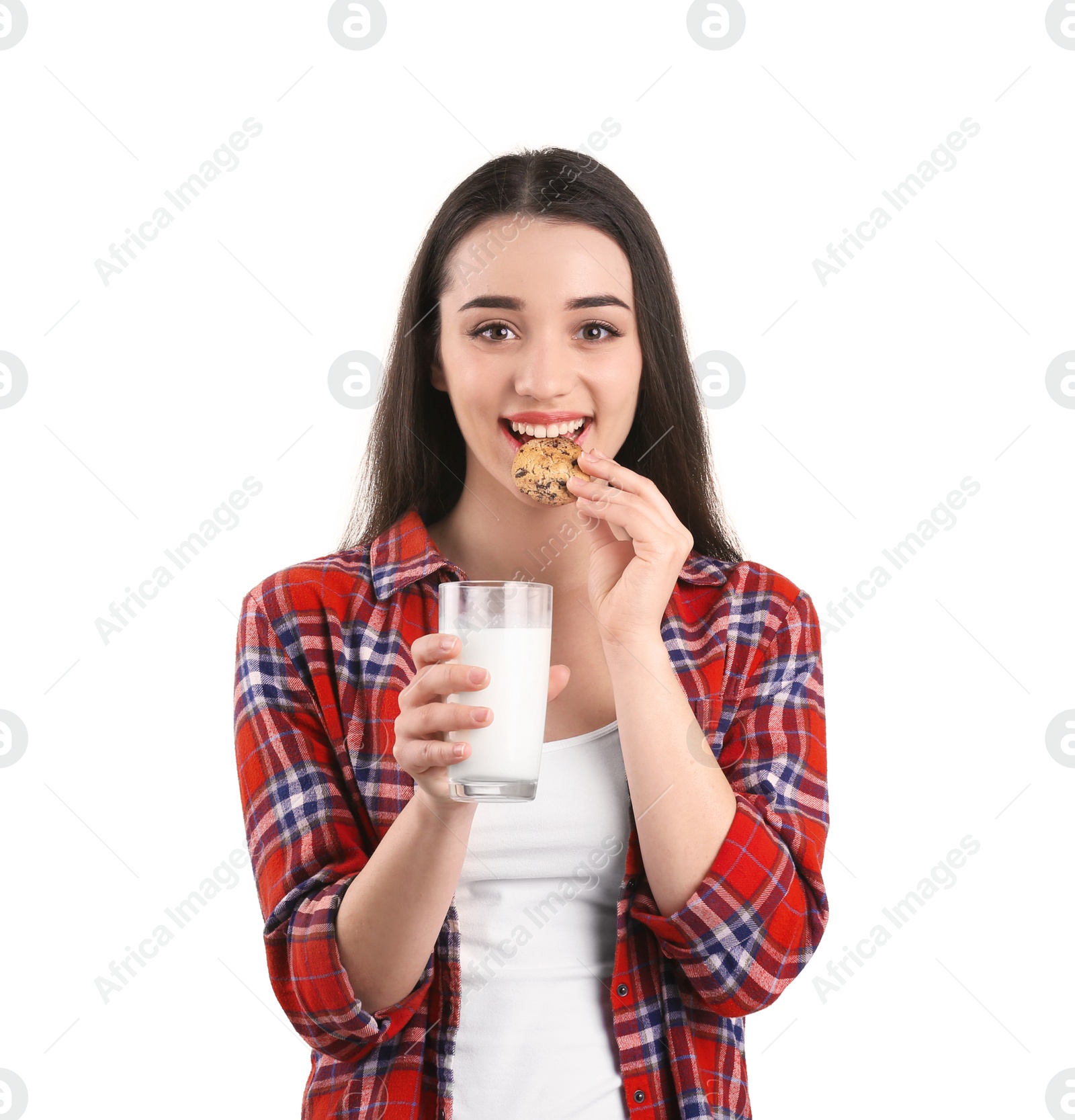 Photo of Beautiful young woman drinking milk with cookie on white background