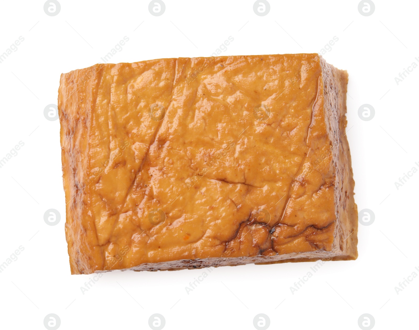 Photo of Block of delicious smoked tofu isolated on white, top view