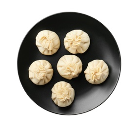 Photo of Plate with tasty dumplings isolated on white, top view