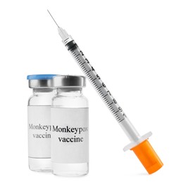 Monkeypox vaccine in vials and syringe on white background