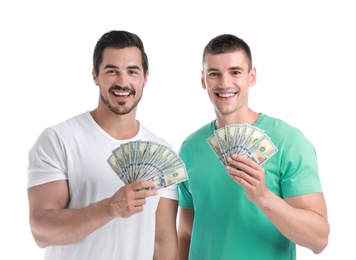 Handsome young men with dollars on white background