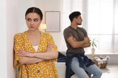 Couple quarreling due to jealousy in relationship at home
