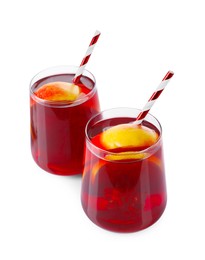 Photo of Christmas Sangria drink in glasses on white background