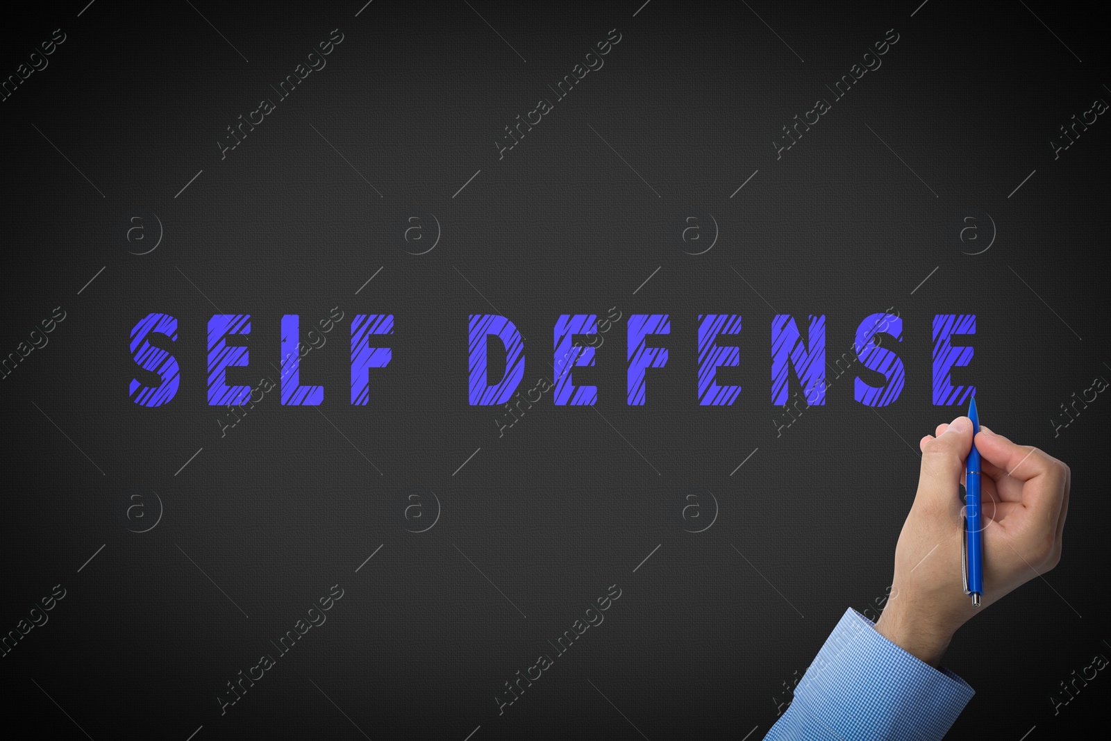 Image of Man writing words Self Defense on black background, closeup