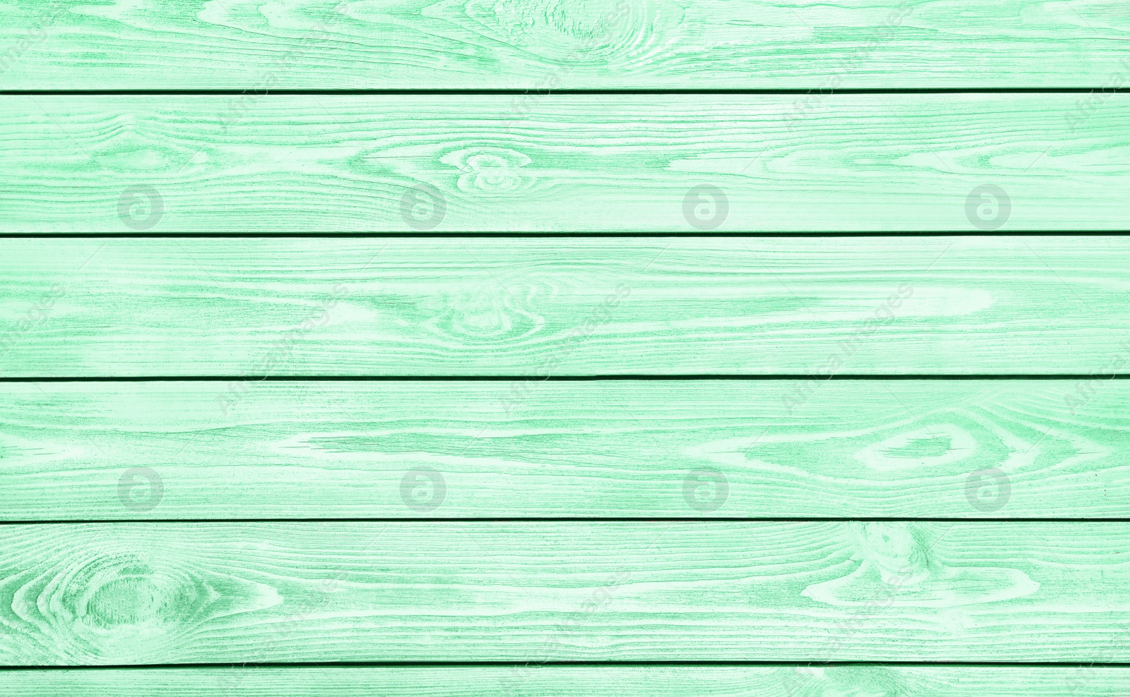 Image of Texture of wooden surface as background. Image toned in mint color 