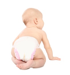 Cute little baby crawling on white background