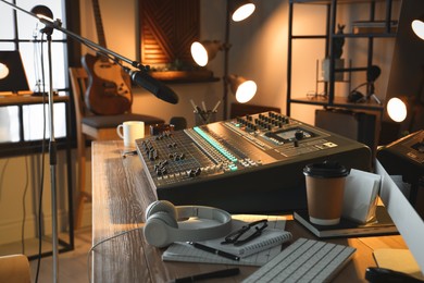 Photo of Professional audio equipment in modern radio studio